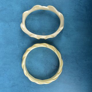 Two Chinese Carved Bangle Bracelets