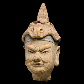Chinese Yuan style painted stucco guardian head