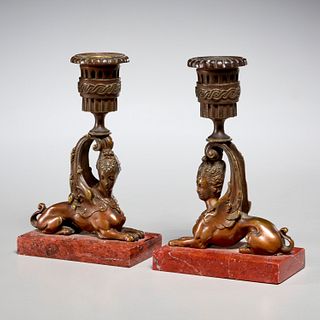 Pair Egyptian Revival bronze sphinx candlesticks