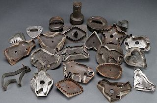 A GROUP OF 21 PRIMITIVE TIN COOKIE CUTTERS