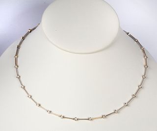 A Diamond and 18K White Gold Station Bar Link Necklace