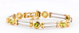 A Peridot and Two Tone 14K Gold Bracelet