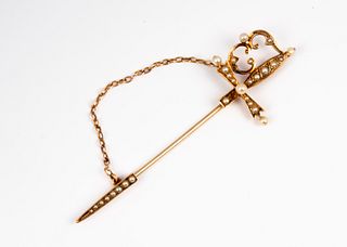 An Antique Yellow Gold and Seed Pearl Sword Pin