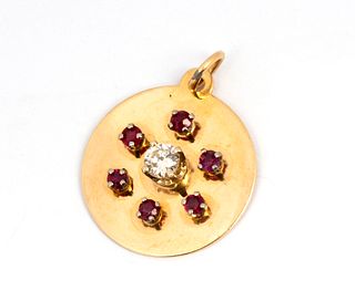 A Vintage 14K Diamond and Ruby Disk Pendant