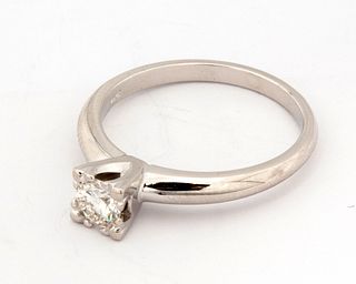 A Diamond and 14K Solitaire