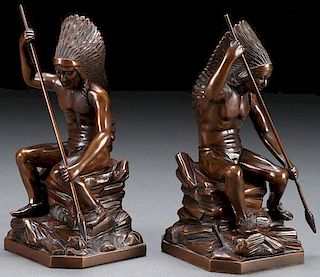 A PAIR OF FIGURAL BRONZED BOOK ENDS