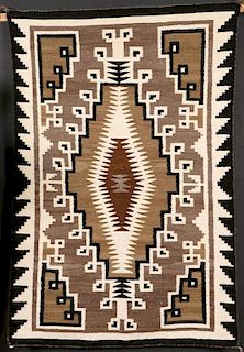 A SOUTHWEST NAVAJO “TWO GRAY HILLS” HANDWOVEN RUG