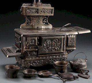 CHILD'S CAST IRON “RIVAL” TOY COOKSTOVE