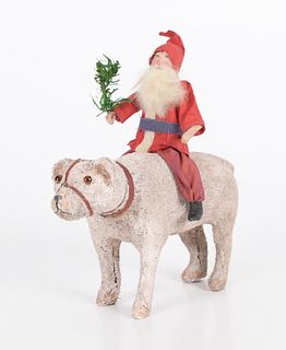 An Antique Santa Riding a Polar Bear, Papier Mache