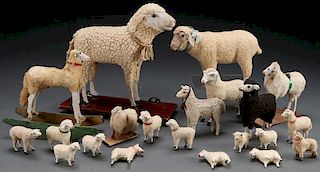 A COLLECTION OF 21 VINTAGE SHEEP FIGURES