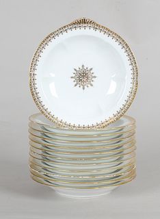 A Set of Twelve Limoges Porcelain Soup Plates