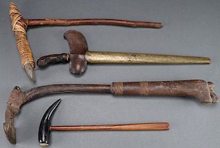 A GROUP OF FOUR INDONESIAN TOOLS
