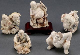 A COLLECTION OF FIVE JAPANESE CARVED IVORY NETSUK