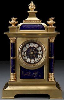 A FRENCH GILT BRONZE AND PORCELAIN MANTLE CLOCK