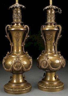 A PAIR OF BRONZE AESTHETIC OIL LAMPS, 19TH C