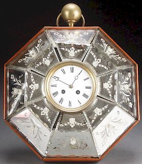 AN INTERESTING ETCHED MIRRORED GLASS WALL CLOCK