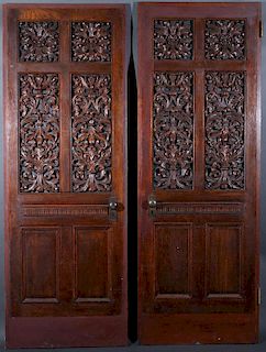 A PAIR OF VICTORIAN OAK PARLOR DOORS, LATE 19TH C