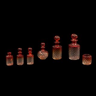 JUEGO DE FRASCOS PERFUMEROS FRANCIA SIGLO XX Elaborados en cristal Uno sellado Baccarat En color rojo degradado 23 cm al...