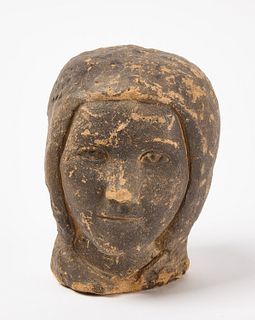 Carved Stone Female Head