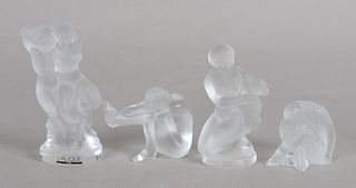 Four Lalique Glass Nude Paperweights