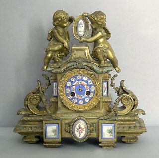 French gilt bronze mantle clock with hand paintedo