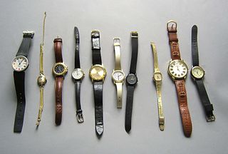 Fourteen wristwatches.