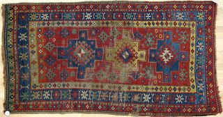 Two Kazak throw rugs, ca. 1900, together with 2 ma