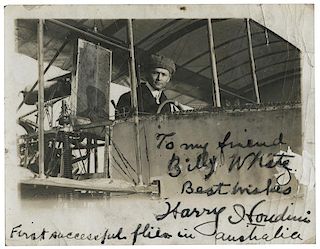 Inscribed and Signed Photograph of Houdini Piloting his Airplane.