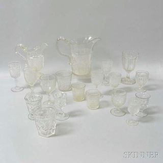 Nineteen Pieces of Colorless Pressed Glass