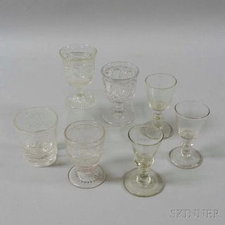 Seven Colorless Pressed and Blown Glass Items