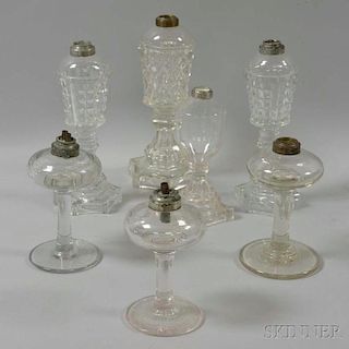 Seven Colorless Glass Oil Lamps