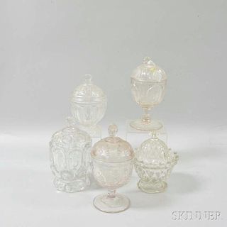 Five Colorless Pressed Glass Covered Footed Dishes