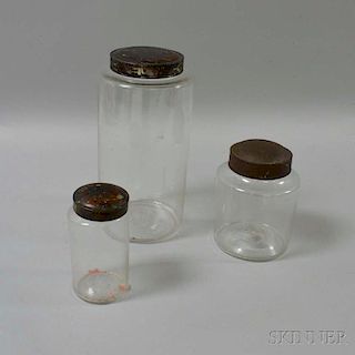 Three Colorless Glass Apothecary Jars