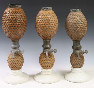 (3) FRENCH CANE-WRAPPED GLASS SELTZER BOTTLES