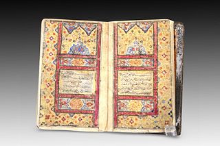 An Islamic Kashmiri Quran from 1126 Written by Hassan Khan with Gold Design on the Inside Cover and Beautiful Enamel Work on the Outside Cover

From a