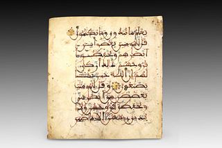 An Islamic Leaf from the Quran Crafted from Vellum during the 13th Century. This Leaf contains 9 Lines of Sacred Quranic Text on Both Sides.

Height: 