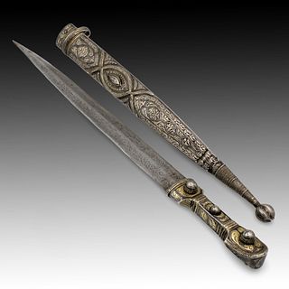 A Caucasian Sword with an Engraved Silver Handle and Niello Decorations from the 19th Century. 

Length: Approximately 53cm 