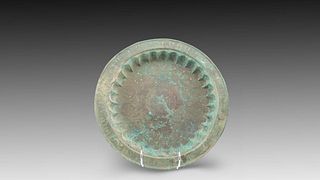 An Islamic Bronze Tray from the 12th Century with Beautiful Silver Inlay with Kufic Writing

Diameter: 31.8cm 