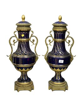 Pair Of Large Porcelain Covered Urns