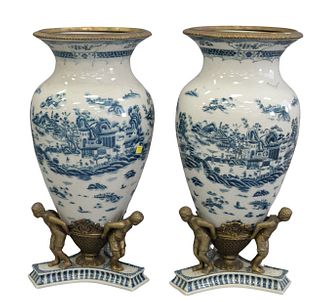 Pair Of Large Blue And White Porcelain Figural Urns