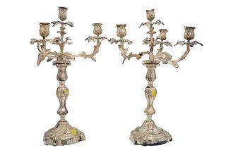 Pair of continental silver-plated four-light candelabra