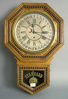 Gilbert Admiral oak regulator wall clock, 28" h.