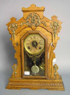 Victorian oak mantle clock with brass mounts, 24 1