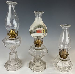 Three Dalzell's Crown Lamps
