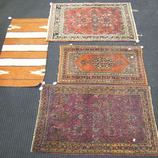 Three oriental mats, together with a flatweave bla