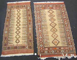 Two Sumac throw rugs, 6' x 3'3" and 6' x 2'10".