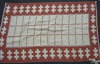 Mexican red and grey woven rug, 9'3" x 5'9".
