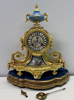 Sevres Style Bronze Clock With Porcelain Inserts .