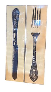 A LARGE PAIR OF KNIFE AND FORK PRINTS IN LUCITE FRAMES