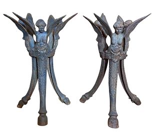 A PAIR OF ANTIQUE IRON FIGURAL TABLE BASES, MID 20TH CENTURY